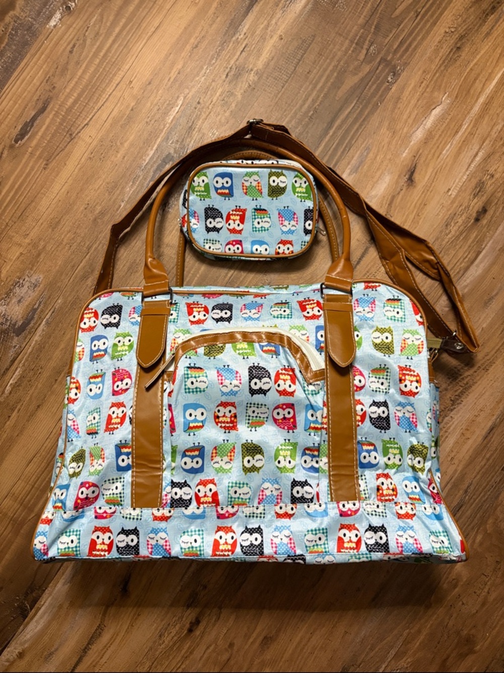 Owl Print Shoulder Bag in Light Blue with Tan Trim, Handles & shoulder strap.